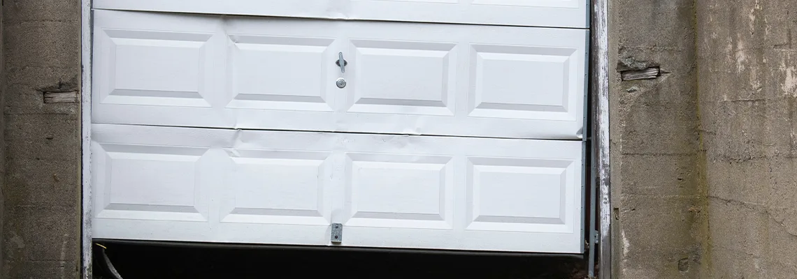 Garage Door Got Hit By A Car Dent Removal in Urbana, IL