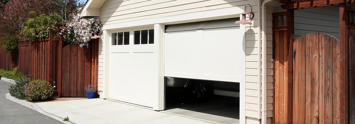 Fix Metal Garage Door Jerking in Urbana, Illinois